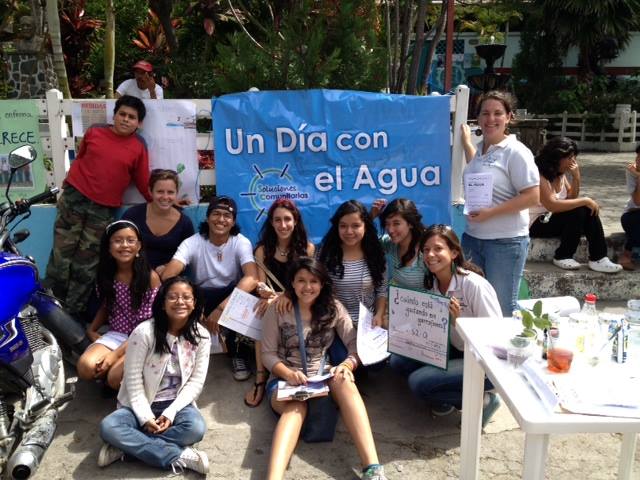 Brand (front right, holding sign) poses with student volunteers from a local high school at "Un Dia Con el Agua" (A Day With Water) in Panajachel – an educational event about the importance of water and to promote water filters. Brand made many lasting friendships during her Practice Experience that she rekindled while working with Community Enterprise Solutions. Photo credit: Nikki Brand