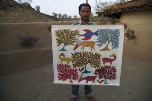 An artisan from Madhya Pradesh who specializes in the traditional art form of Gond painting showcases his work.