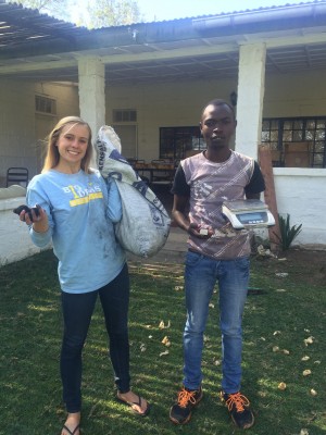 Catherine: Catherine Berner working with the Sanivation team in Kenya to implement a process that created consistent briquettes.