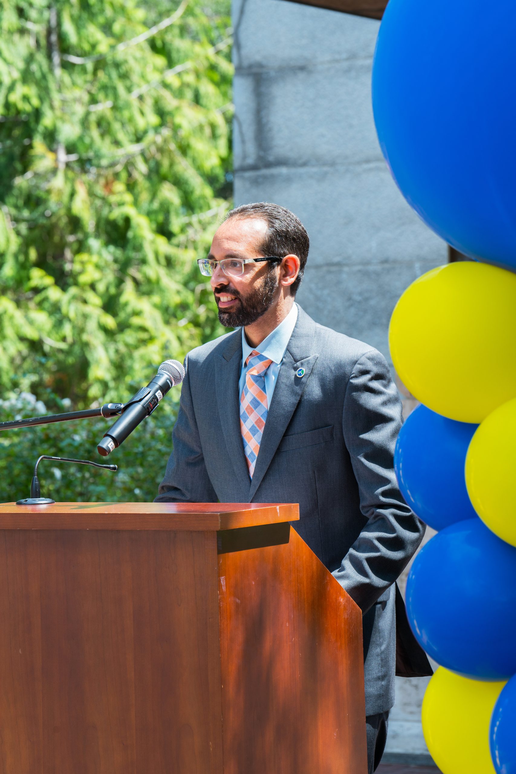 Chetan Chowdhry, the Director of Student Programs, congratulates students at the 2022 GPP graduation ceremony.