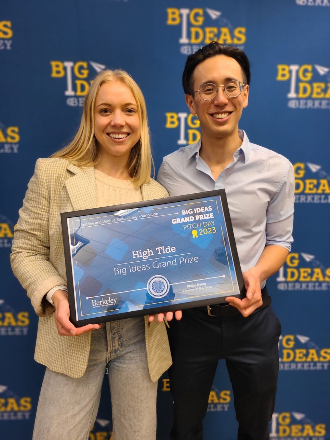 Kira Erickson and Ivan Jayapurna holding their Big Ideas Grand Prize certificate for "High Tide".